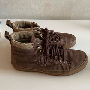 brown high top distressed leather vans
